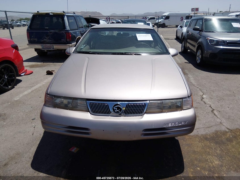 1994 Mercury Cougar VIN 1MELM6247RH604808 IAAI salvage auction — NORMAL WEAR, Clear (New Mexico), sold $675 on 2026-08-05 (photo 6)