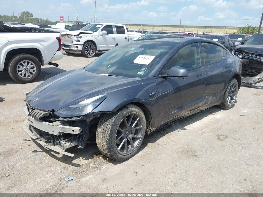 2022 Tesla Model 3 VIN 5YJ3E1EBXNF208037 IAAI salvage auction — ROLLOVER, Wait Title, sold $3,300 on 2026-09-02 (photo 2)