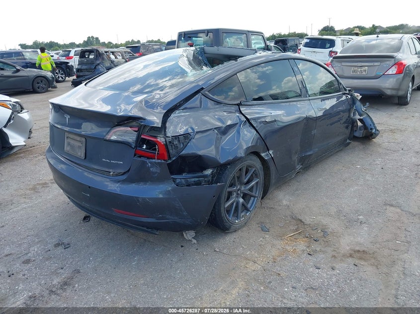 2022 Tesla Model 3 VIN 5YJ3E1EBXNF208037 IAAI salvage auction — ROLLOVER, Wait Title, sold $3,300 on 2026-09-02 (photo 4)