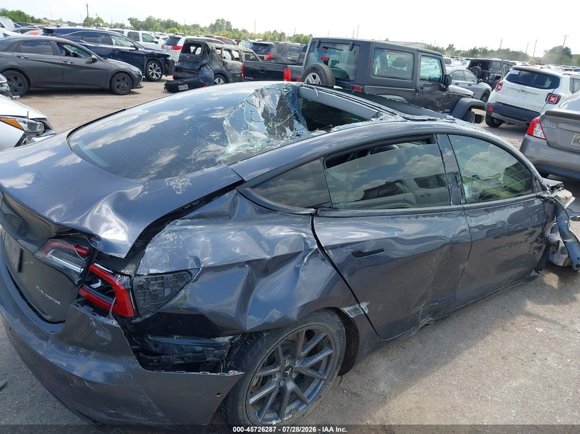 2022 Tesla Model 3 VIN 5YJ3E1EBXNF208037 IAAI salvage auction — ROLLOVER, Wait Title, sold $3,300 on 2026-09-02 (photo 6)