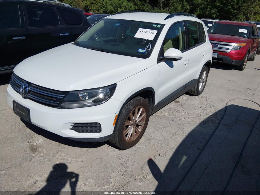 2015 Volkswagen Tiguan VIN WVGAV7AX2FW607058 IAAI salvage auction — NORMAL WEAR, Original (Texas), sold $1,300 on 2026-08-10 (photo 2)