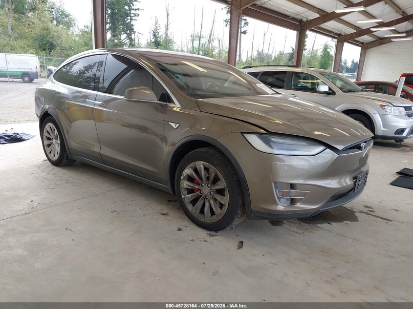 2016 Tesla Model x VIN 5YJXCAE49GF000212 — IAAI salvage auction photo