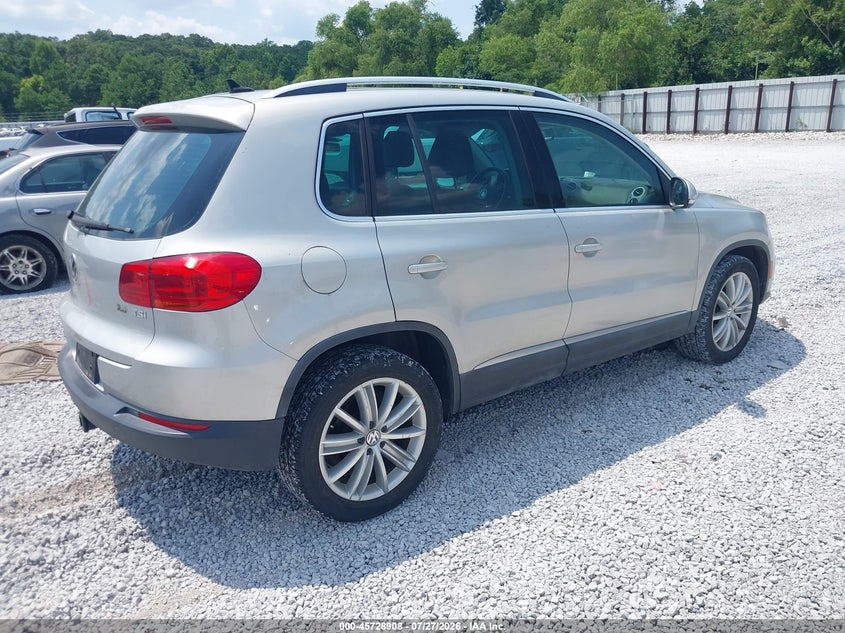 2013 Volkswagen Tiguan VIN WVGAV7AX6DW547203 IAAI salvage auction — NORMAL WEAR, Salvage Title, sold $375 on 2026-08-06 (photo 4)