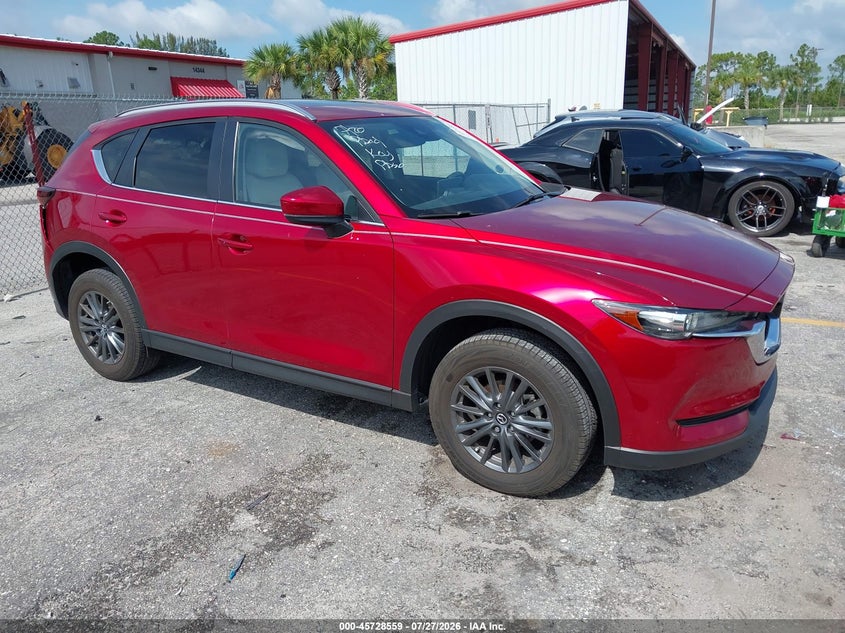 2021 Mazda Cx-5 VIN JM3KFACM8M0410344 IAAI salvage auction — REAR END, Rebuildable (Florida), sold $7,100 on 2026-08-19 (photo 1)