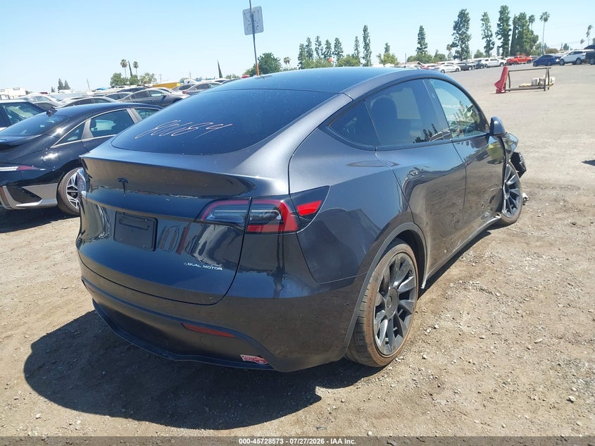 2024 Tesla Model y VIN 7SAYGDEE0RF025931 IAAI salvage auction — RIGHT FRONT, Salvage (California), sold $10,100 on 2026-09-10 (photo 4)