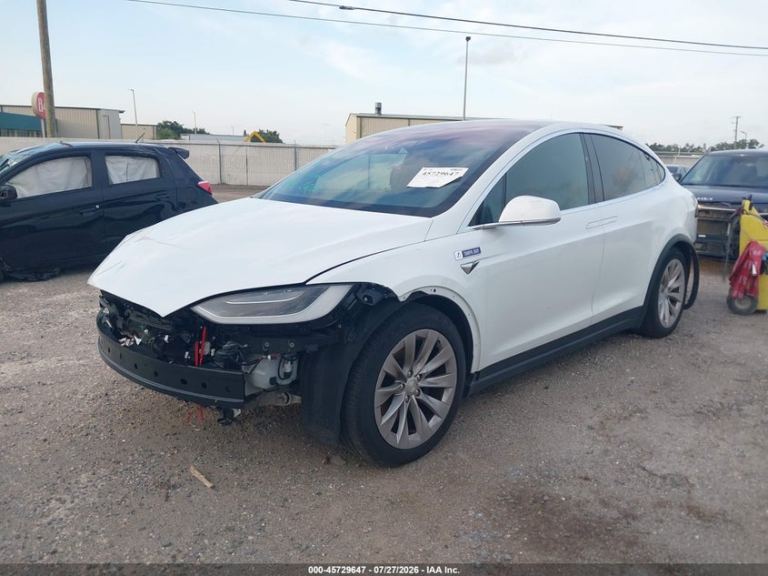 2017 Tesla Model x VIN 5YJXCDE28HF068325 IAAI salvage auction — FRONT & REAR, Rebuildable (Florida), sold $8,550 on 2026-08-20 (photo 2)