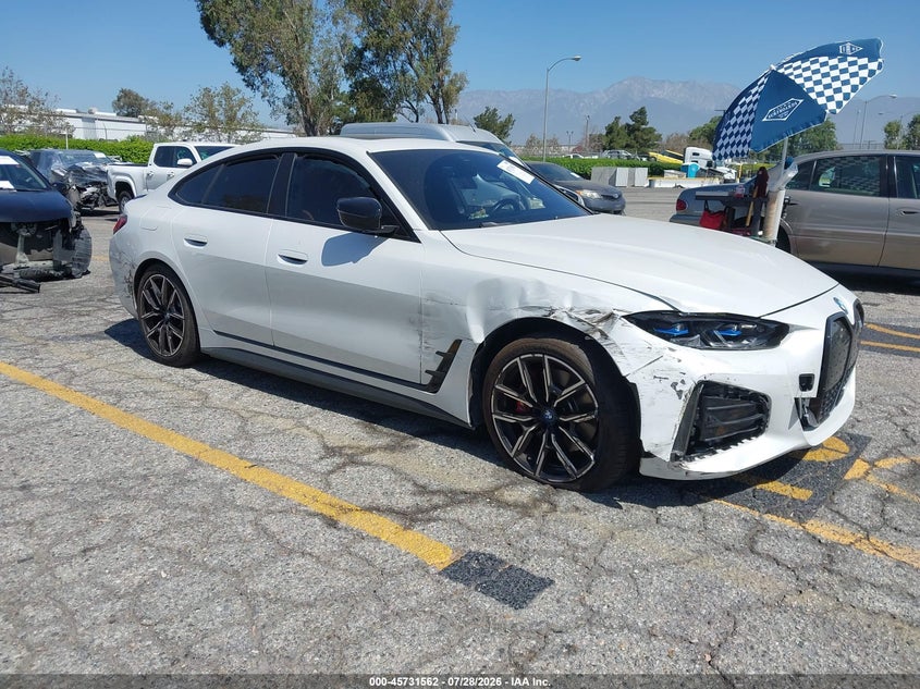 2023 BMW I4 VIN WBY73AW0XPFP03355 IAAI salvage auction — SIDE, Salvage (California), sold $12,800 on 2026-08-31 (photo 1)