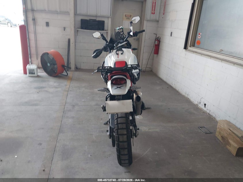 2025 Ducati Desertx VIN ZDMXANDTXSB010107 IAAI salvage auction — RIGHT SIDE, Wait Title, sold $7,950 on 2026-09-09 (photo 6)