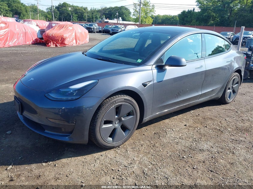 2023 Tesla Model 3 VIN 5YJ3E1EA3PF638731 IAAI salvage auction — RIGHT SIDE, Salvage (Idaho), sold $10,725 on 2026-09-08 (photo 2)