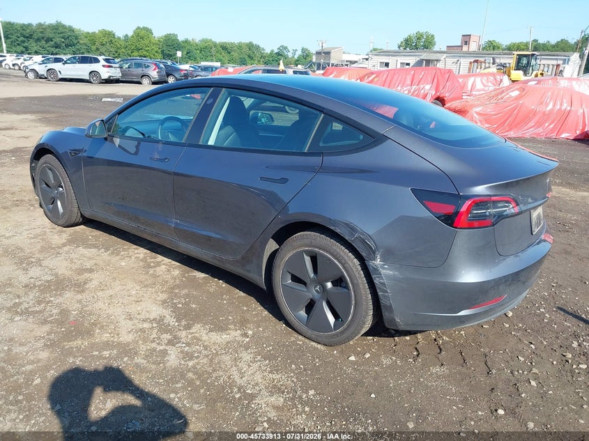 2023 Tesla Model 3 VIN 5YJ3E1EA3PF638731 IAAI salvage auction — RIGHT SIDE, Salvage (Idaho), sold $10,725 on 2026-09-08 (photo 3)