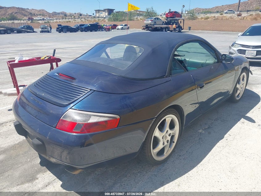 2000 Porsche 911 VIN WP0CA2998YS652937 IAAI salvage auction — SIDE, Salvage (California), sold $7,100 on 2026-08-26 (photo 4)