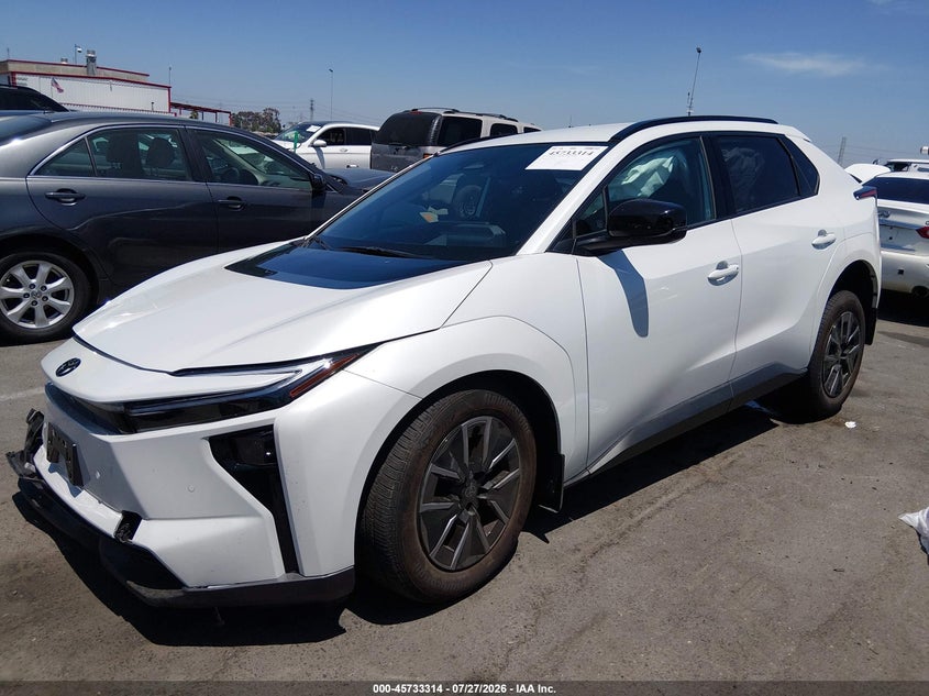 2026 Toyota Bz4x VIN JTMBCAEB1TA004475 IAAI salvage auction — SIDE, Wait Title, sold $8,000 on 2026-08-16 (photo 2)