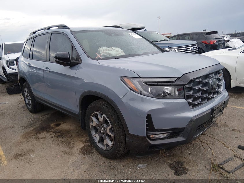 2023 Honda Passport VIN 5FNYF8H6XPB035455 — IAAI salvage auction photo