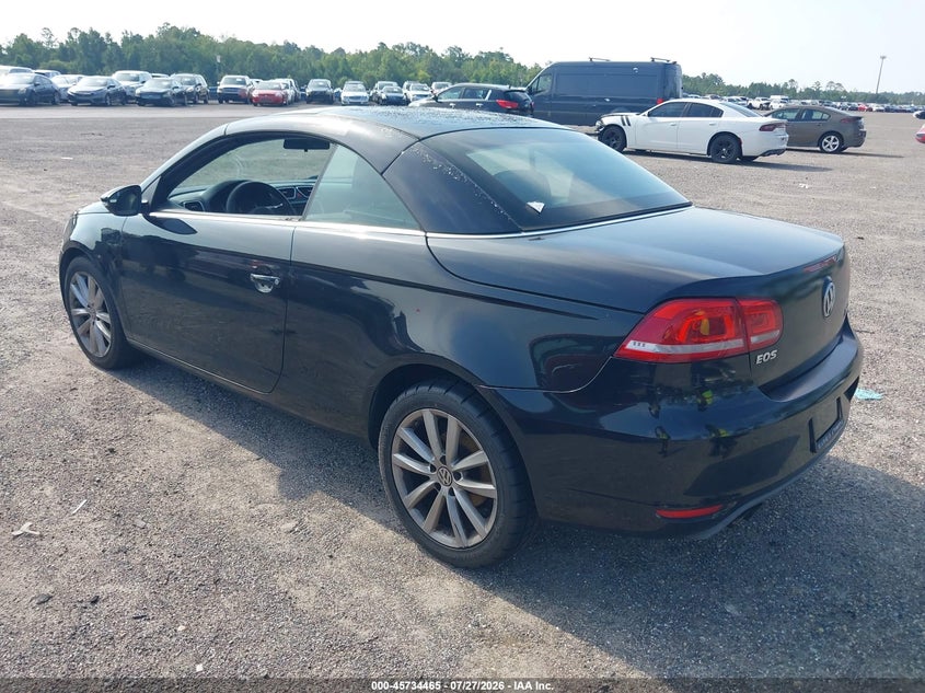 2014 Volkswagen Eos VIN WVWBW8AH1EV001596 IAAI salvage auction — NORMAL WEAR, Clear (Florida), sold $400 on 2026-08-04 (photo 3)