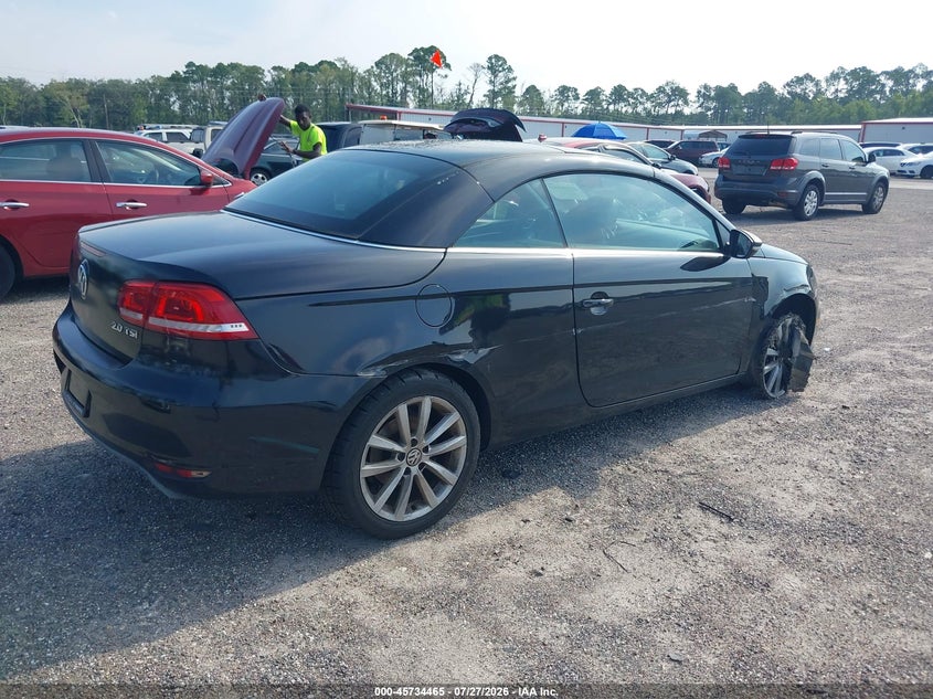 2014 Volkswagen Eos VIN WVWBW8AH1EV001596 IAAI salvage auction — NORMAL WEAR, Clear (Florida), sold $400 on 2026-08-04 (photo 4)