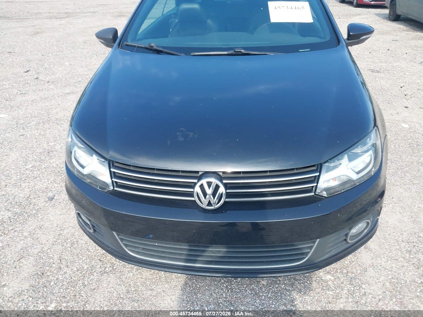 2014 Volkswagen Eos VIN WVWBW8AH1EV001596 IAAI salvage auction — NORMAL WEAR, Clear (Florida), sold $400 on 2026-08-04 (photo 6)