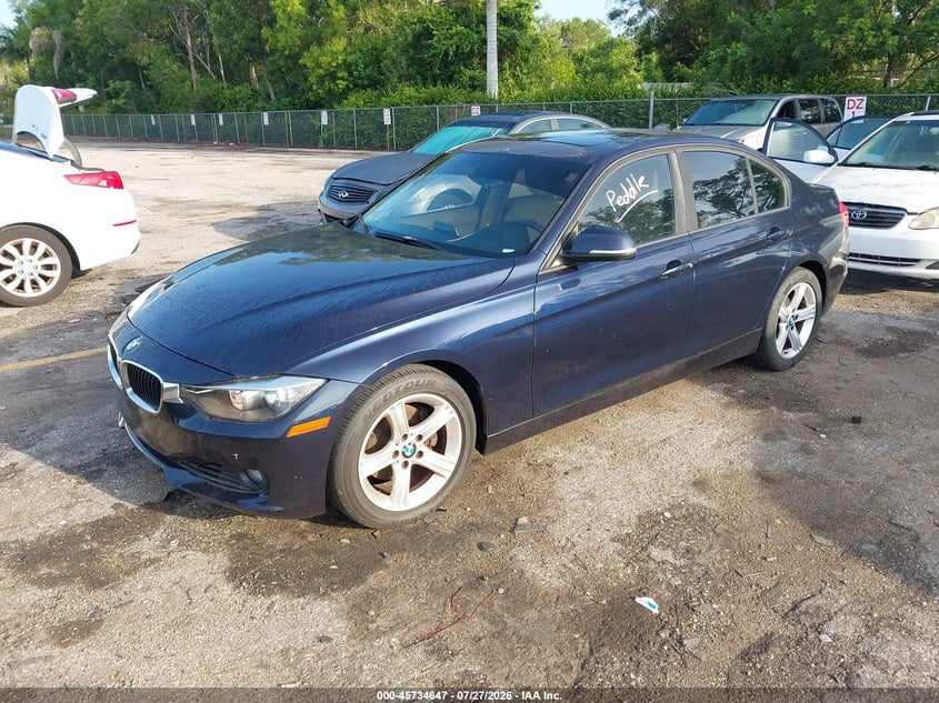 2013 BMW 3er VIN WBA3A5C50DF358424 IAAI salvage auction — NORMAL WEAR, Clear (Florida), sold $875 on 2026-09-13 (photo 2)
