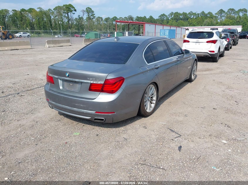 2014 BMW 7er VIN WBAYE8C55ED134882 IAAI salvage auction — NORMAL WEAR, Clear (Florida), sold $1,150 on 2026-08-04 (photo 4)