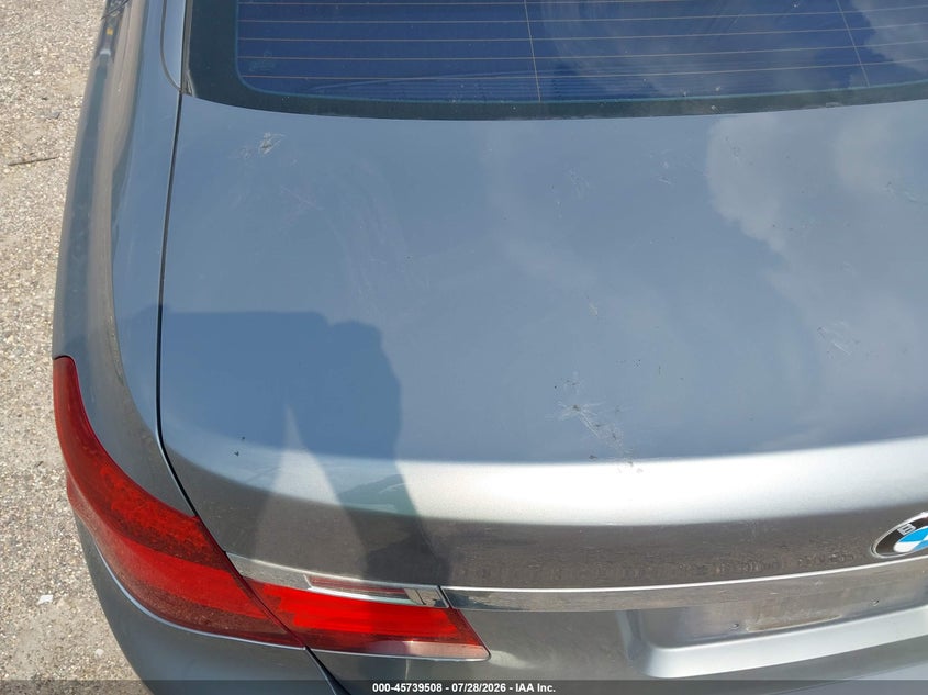 2014 BMW 7er VIN WBAYE8C55ED134882 IAAI salvage auction — NORMAL WEAR, Clear (Florida), sold $1,150 on 2026-08-04 (photo 6)