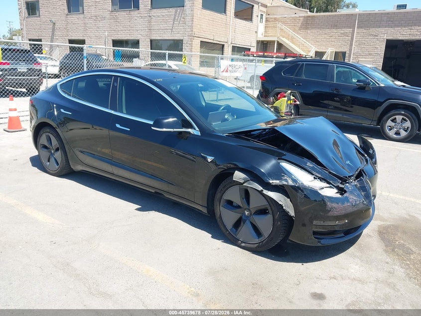 2018 Tesla Model 3 VIN 5YJ3E1EB8JF084599 IAAI salvage auction — FRONT END, Wait Title, sold $3,900 on 2026-10-20 (photo 1)