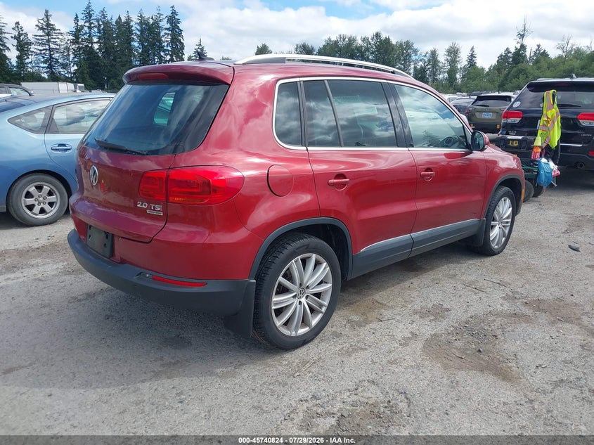 2013 Volkswagen Tiguan VIN WVGBV3AX0DW113579 IAAI salvage auction — NORMAL WEAR, Clear (Washington), sold $425 on 2026-08-05 (photo 4)