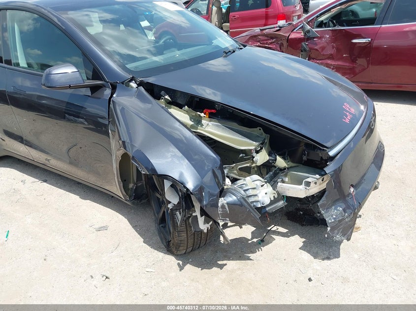 2026 Tesla Model y VIN 7SAYGDEE4TA413152 IAAI salvage auction — FRONT END, Salvage Title, sold $18,800 on 2026-09-08 (photo 6)