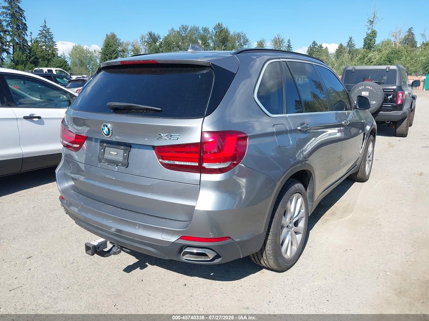 2016 BMW X5 VIN 5UXKT0C56G0F75240 IAAI salvage auction — NORMAL WEAR, Salvage Title, sold $6,700 on 2026-08-19 (photo 4)