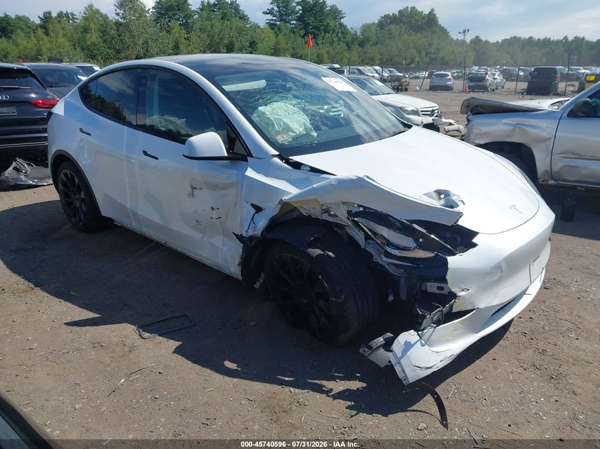2023 Tesla Model Y VIN 7SAYGDEE2PA080620 IAAI salvage auction — RIGHT FRONT, Salvage Title, sold $9,800 on 2026-10-02 (photo 1)