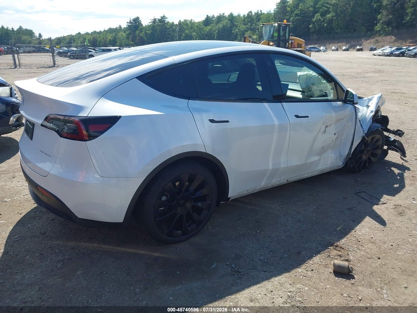 2023 Tesla Model Y VIN 7SAYGDEE2PA080620 IAAI salvage auction — RIGHT FRONT, Salvage Title, sold $9,800 on 2026-10-02 (photo 4)