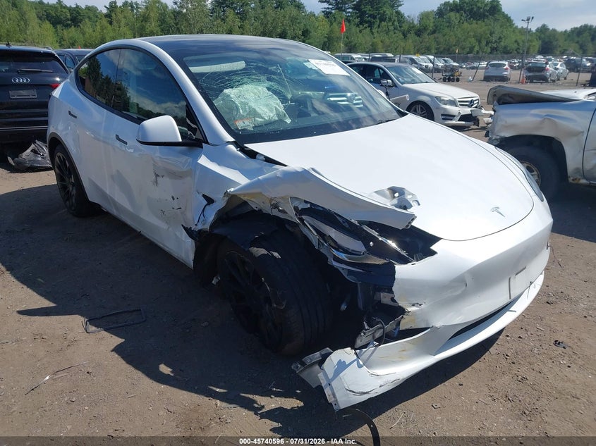 2023 Tesla Model Y VIN 7SAYGDEE2PA080620 IAAI salvage auction — RIGHT FRONT, Salvage Title, sold $9,800 on 2026-10-02 (photo 6)