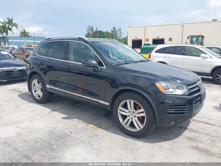 2013 Volkswagen Touareg VIN WVGEP9BP3DD004506 IAAI salvage auction — NORMAL WEAR, Clear (Illinois), sold $1,050 on 2026-07-30 (photo 1)