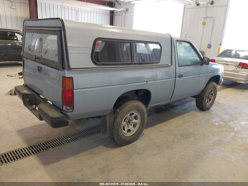 1987 Nissan D21 VIN JN6ND11Y5HW003714 IAAI salvage auction — NORMAL WEAR, Rebuilt/Restored (Utah), sold $600 on 2026-07-31 (photo 4)