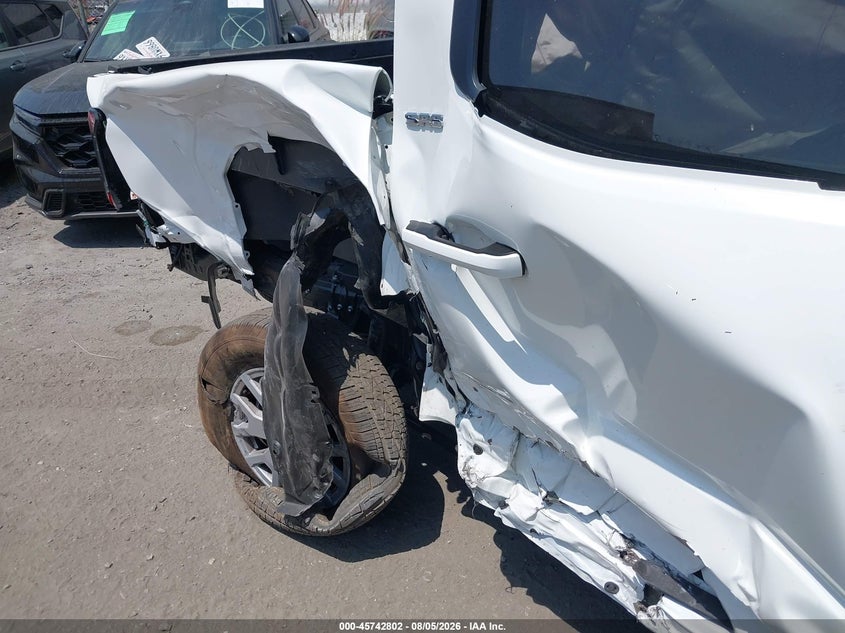 2026 Toyota Tacoma VIN 3TMKB5FN7TM068087 IAAI salvage auction — Left & Right Side, Salvage Title, sold $11,025 on 2026-09-23 (photo 6)