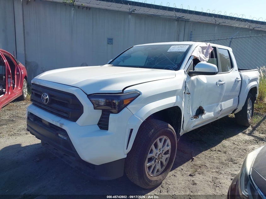 2026 Toyota Tacoma VIN 3TMKB5FN7TM068087 IAAI salvage auction — Left & Right Side, Salvage Title, sold $11,025 on 2026-09-23 (photo 2)
