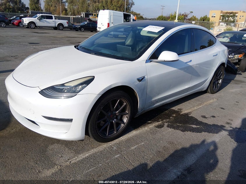 2018 Tesla Model 3 VIN 5YJ3E1EA2JF053002 IAAI salvage auction — REAR END, Wait Title, sold $4,700 on 2026-08-24 (photo 2)