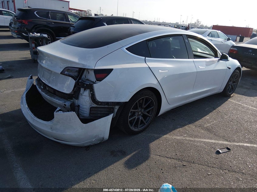 2018 Tesla Model 3 VIN 5YJ3E1EA2JF053002 IAAI salvage auction — REAR END, Wait Title, sold $4,700 on 2026-08-24 (photo 4)
