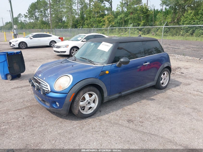 2007 Mini Cooper VIN WMWMF33557TU60186 IAAI salvage auction — NORMAL WEAR, Clear (Florida), sold $25 on 2026-08-04 (photo 2)