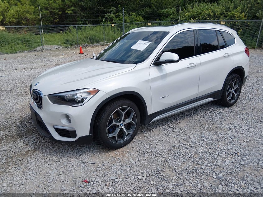 2018 BMW X1 VIN WBXHU7C30J5H43077 IAAI salvage auction — SIDE, Salvage Title, sold $2,425 on 2026-10-08 (photo 2)