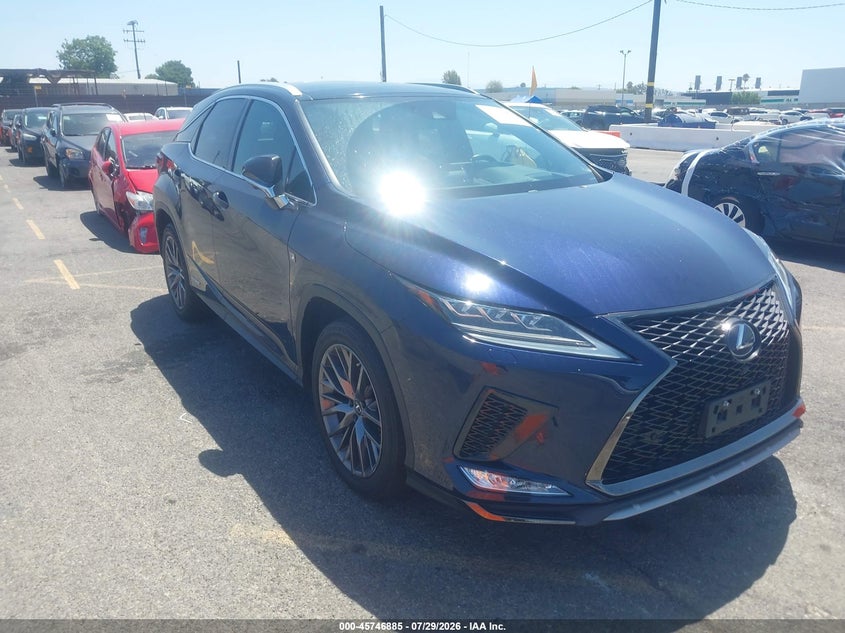 2022 Lexus Rx VIN 2T2YGMDA4NC084129 — IAAI salvage auction photo