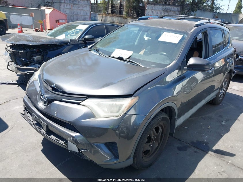 2016 Toyota Rav 4 VIN 2T3ZFREVXGW306871 IAAI salvage auction — FRONT & REAR, Salvage Title, sold $3,100 on 2026-08-31 (photo 2)