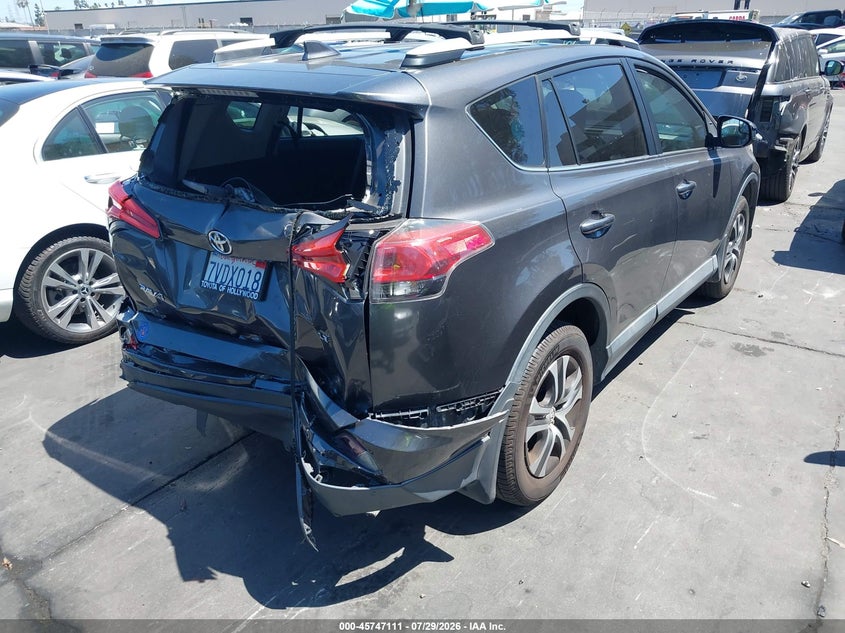 2016 Toyota Rav 4 VIN 2T3ZFREVXGW306871 IAAI salvage auction — FRONT & REAR, Salvage Title, sold $3,100 on 2026-08-31 (photo 4)