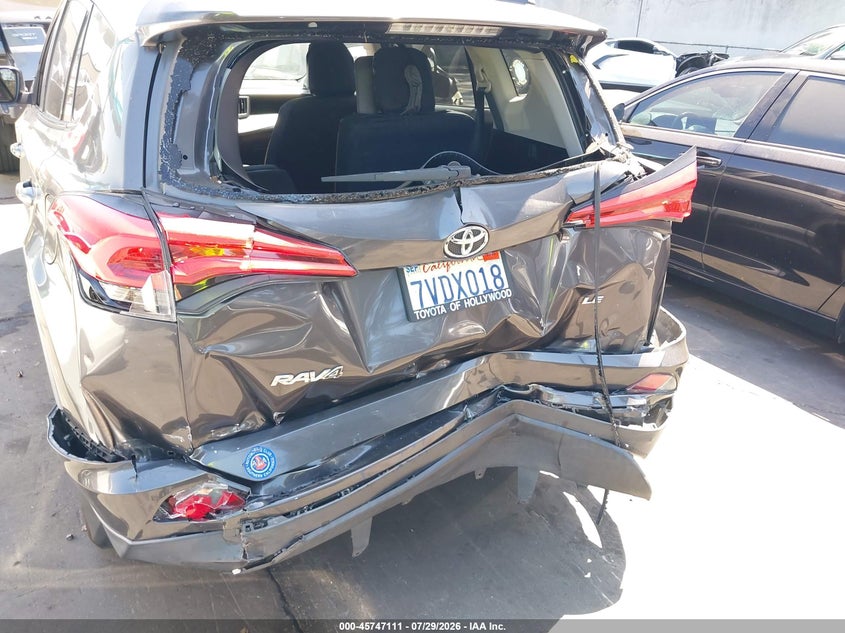 2016 Toyota Rav 4 VIN 2T3ZFREVXGW306871 IAAI salvage auction — FRONT & REAR, Salvage Title, sold $3,100 on 2026-08-31 (photo 6)