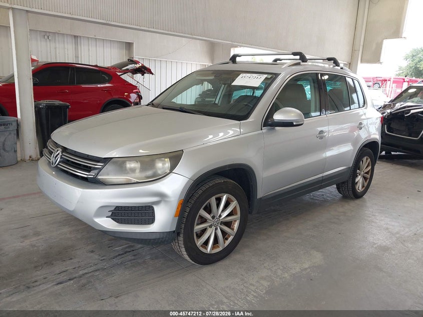 2017 Volkswagen Tiguan VIN WVGRV7AX6HW502853 IAAI salvage auction — RIGHT SIDE, Salvage Title, sold $2,000 on 2026-08-12 (photo 2)