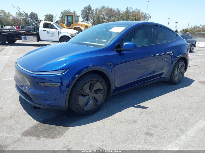 2026 Tesla Model y VIN 7SAYGDEE3TF455184 IAAI salvage auction — RIGHT REAR, Wait Title, sold $27,500 on 2026-09-10 (photo 2)