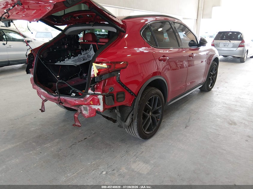 2021 Alfa romeo Stelvio VIN ZASPAJAN8M7C98619 IAAI salvage auction — REAR END, Salvage Title, sold $5,600 on 2026-08-09 (photo 4)