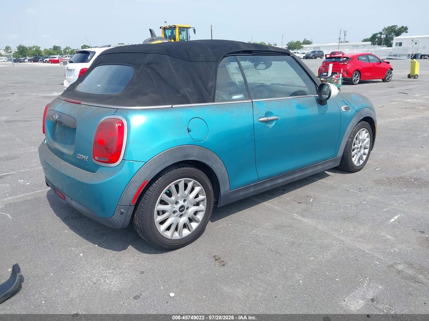 2016 Mini Convertible VIN WMWWG5C58G3C19596 IAAI salvage auction — NORMAL WEAR, Clear (New Jersey), sold $1,325 on 2026-08-17 (photo 4)