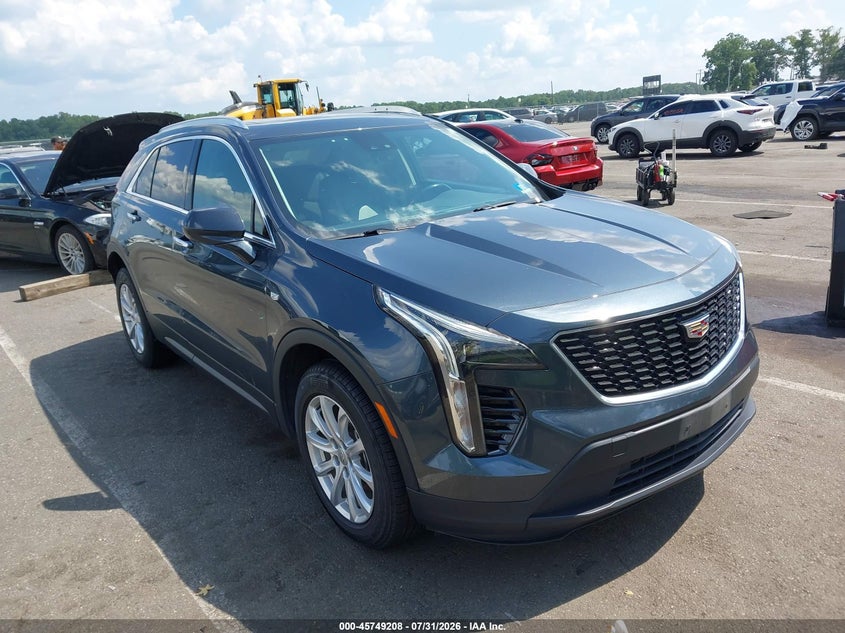 2021 Cadillac Xt4 VIN 1GYFZBR41MF009028 — IAAI salvage auction photo