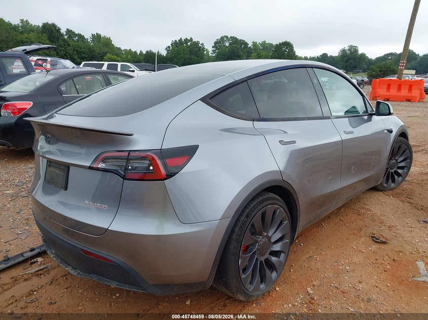 2024 Tesla Model y VIN 7SAYGDEFXRA303594 IAAI salvage auction — SIDE, Salvage (North Carolina), sold $16,500 on 2026-08-30 (photo 4)