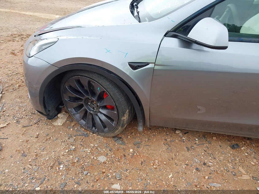 2024 Tesla Model y VIN 7SAYGDEFXRA303594 IAAI salvage auction — SIDE, Salvage (North Carolina), sold $16,500 on 2026-08-30 (photo 6)