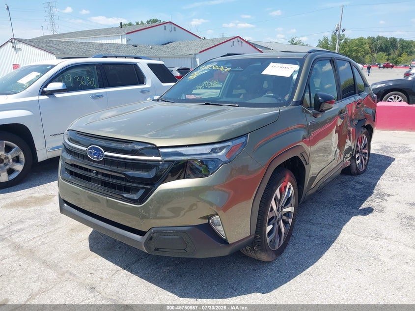 2025 Subaru Forester VIN JF2SLSTD0SH451199 IAAI salvage auction — SIDE, Salvage Title, sold $12,100 on 2026-08-23 (photo 2)